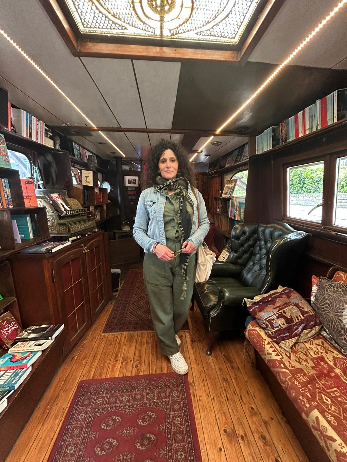 Nora surrounded by books